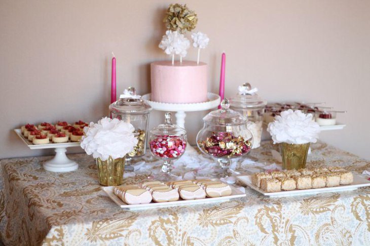 Sweet gold and pink themed bridal shower dessert table