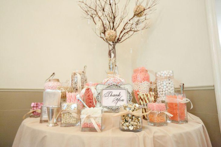 Sweet white toned wedding candy table