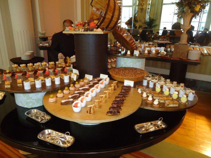 Thanksgiving dessert table setting with pie and sweets