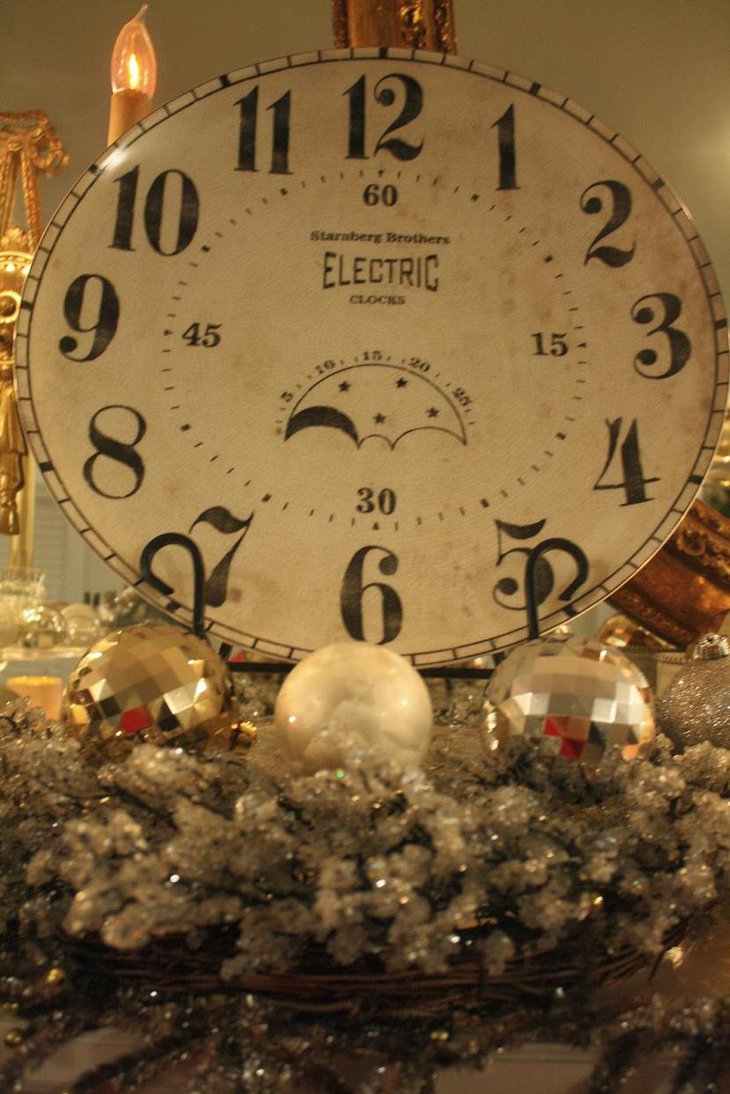 The Table Centerpiece for New Years Eve with a Gaint Clock and Silver Balls