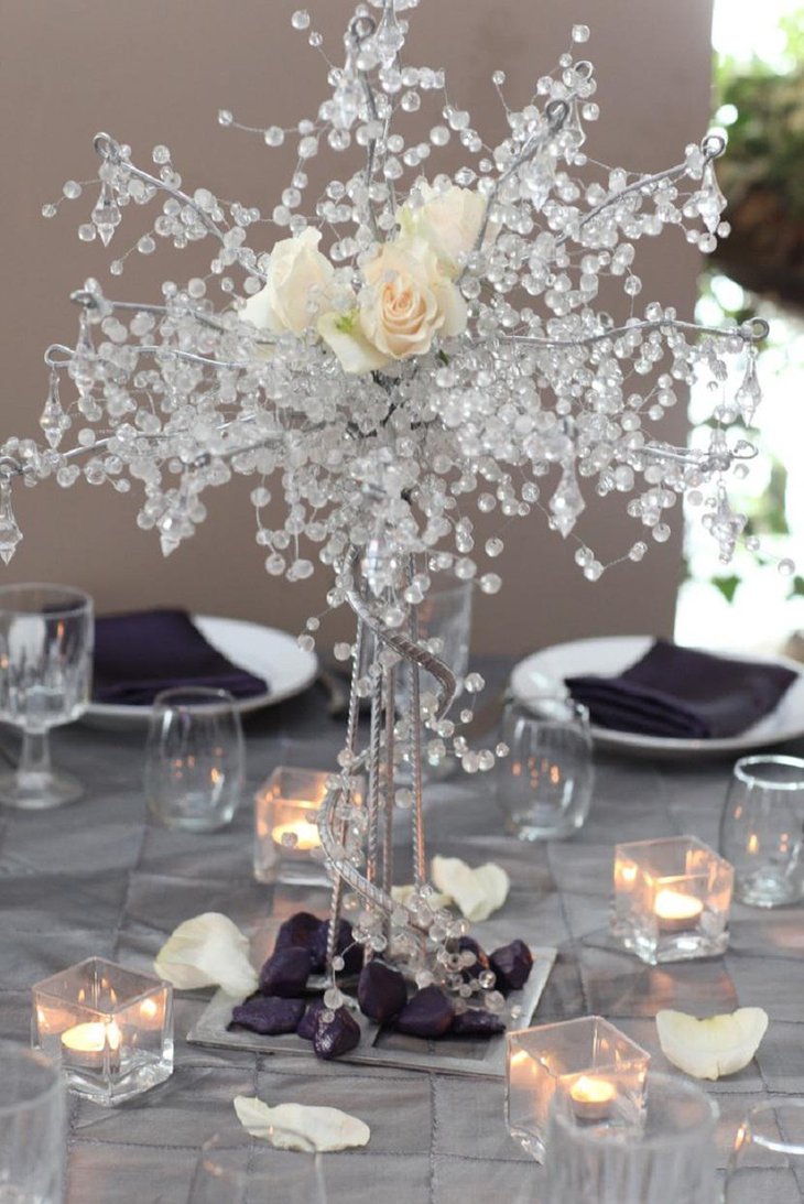 The Table Centerpiece for New Years Eve with Crystal Tree and White Flowers