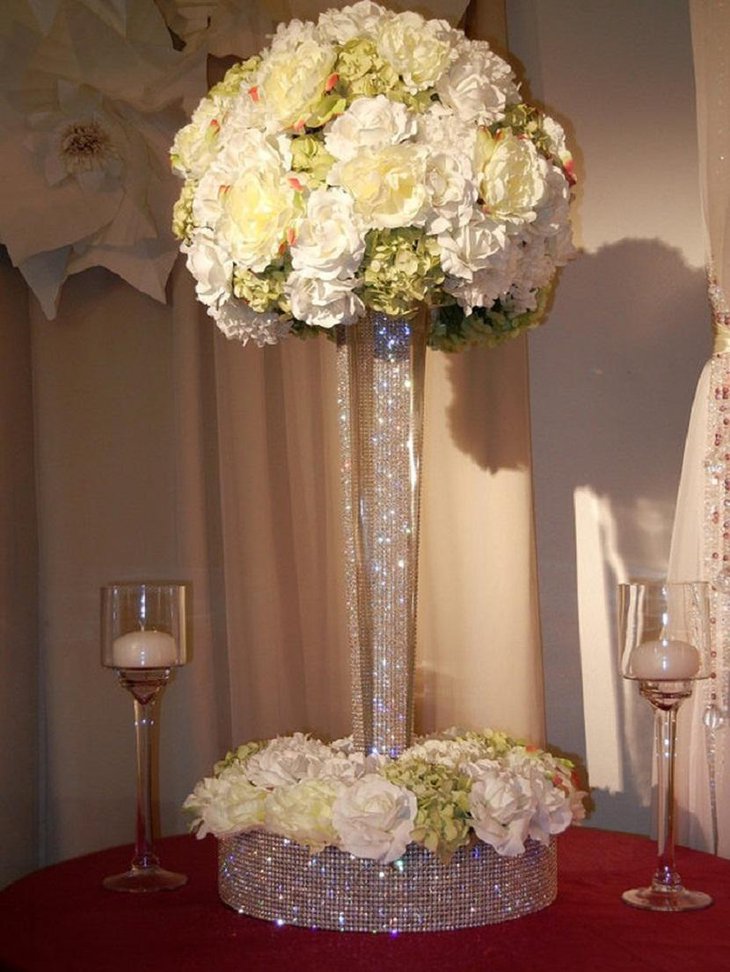 The Table Centerpiece for New Years Eve with White Flowers and Fine Crystals