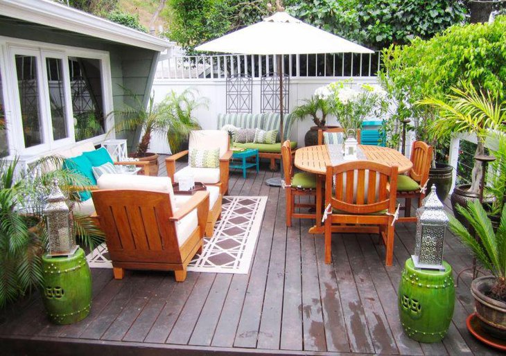 This balcony patio table looks enticing with a floral centerpiece