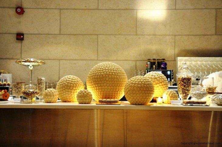 This Christmas dessert party table has been decked using golden and white treats