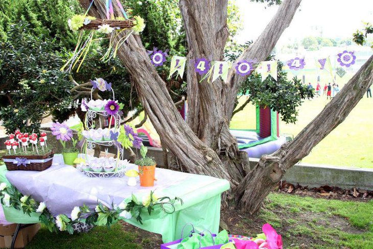 Tinkerbell cupcake stand centerpiece decks up this spring birthday table