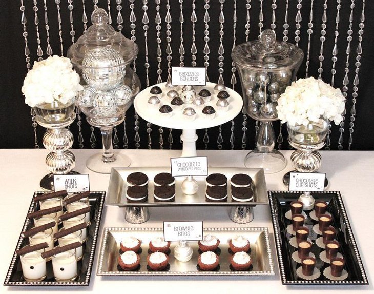 Unique All Black and White Wedding Dessert Table with Flowers