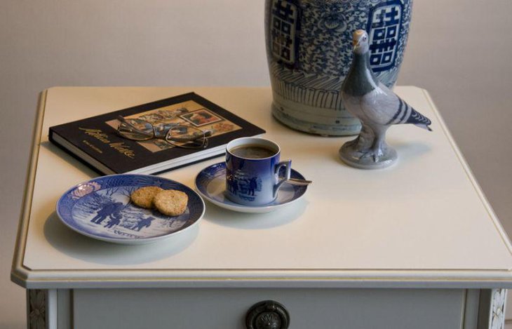 Unique blue ceramic pigeon figurine as coffee table centerpiece