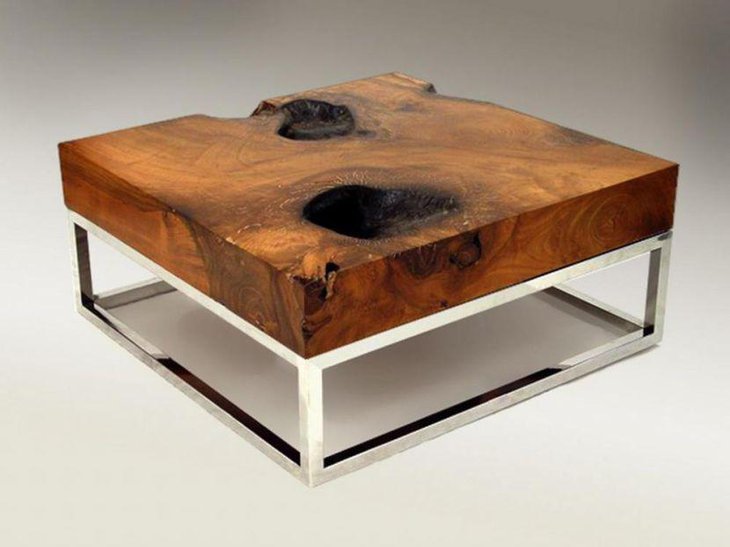 Unique coffee table idea with thick wooden top and metal base