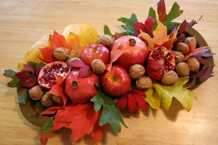 Unqiue winter table fruity centerpiece in red accents