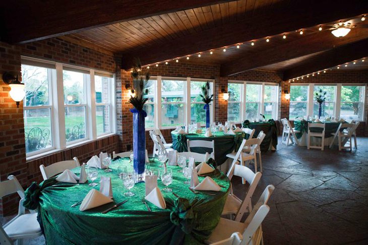 Velvet Table Linen for Weddings with Peacock Feather Centerpieces