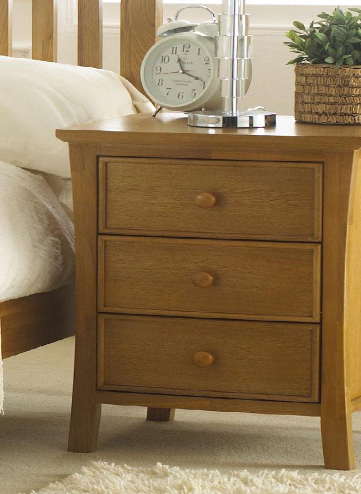 Vintage bedside table embellished with a decorative alarm clock