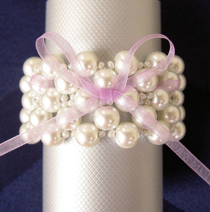 Vintage pearl napkin rings decor on wedding table
