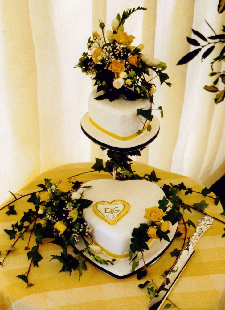 Wedding cake table decorations with yellow accents