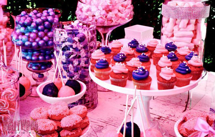 Wedding candy table with purple and pink colour decor