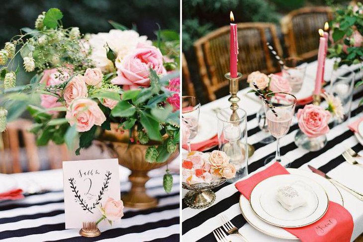 Wedding table with black and white striped runner and godlen rimmed plates