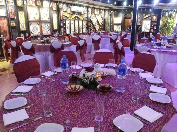 White floral arrangements seen displayed on sweet 16 birthday tables