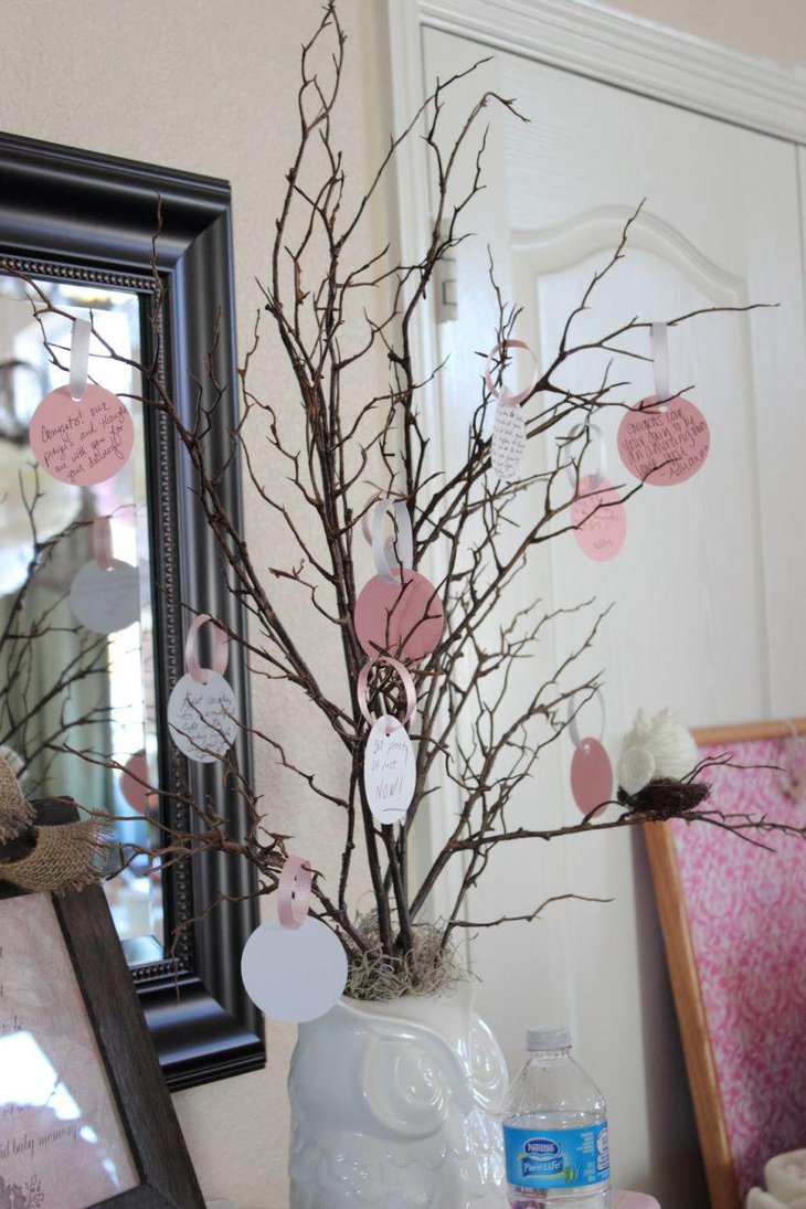 White owl vase with branch centerpiece