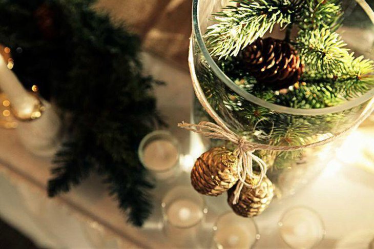 Winter forest table decor with greens and twine