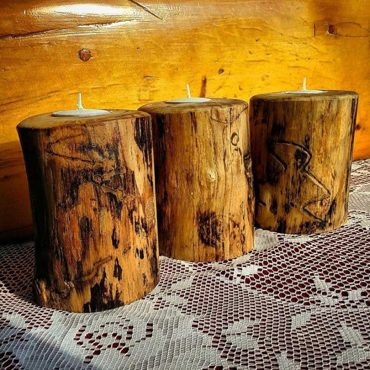 Wooden candle holder centerpieces on a country wedding table