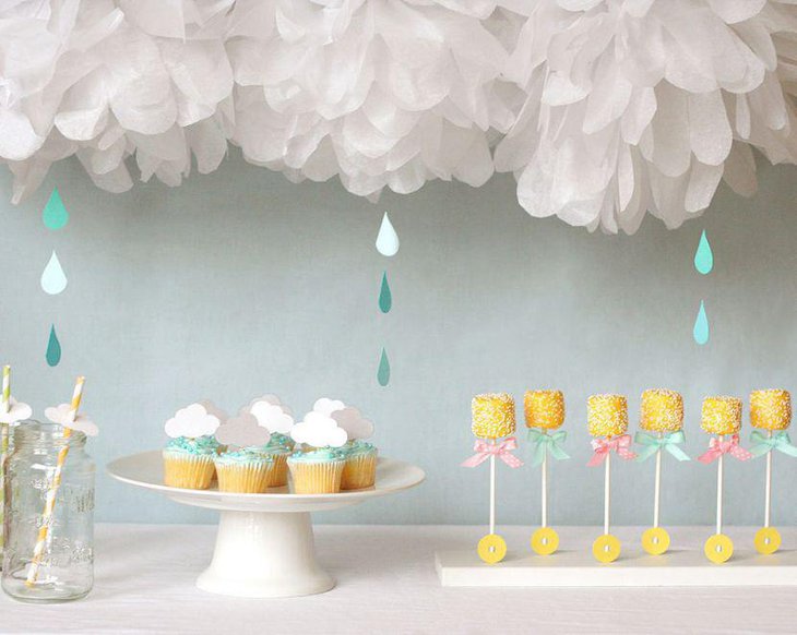 Yellow marshmallow rattle favors for a baby shower