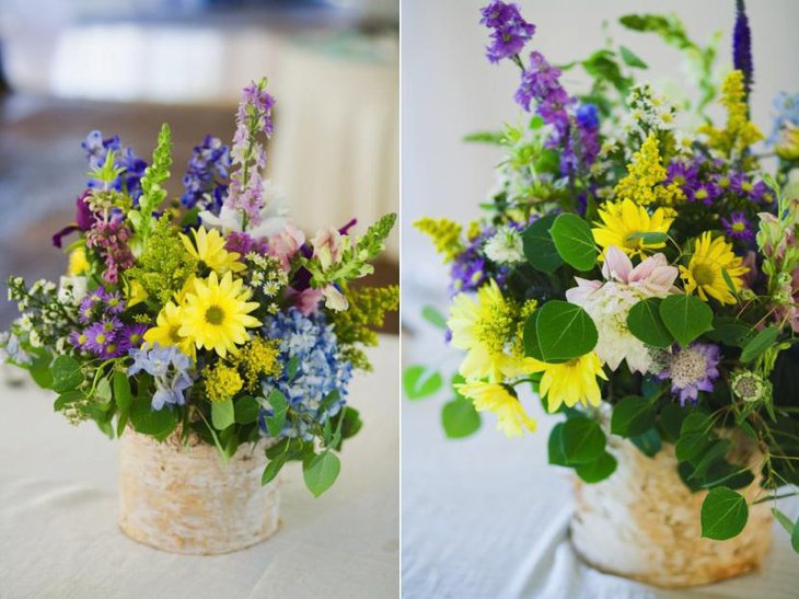 yellow purple blue white wildflower inspired birch centerpiece